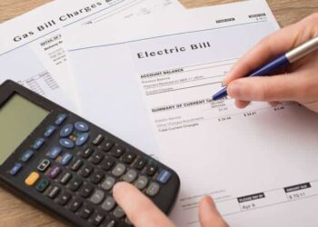 When one was out of the country, why did one receive a high electricity bill?