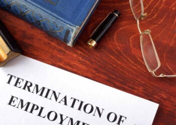 Is it possible to stay in the UAE after being terminated from a job?