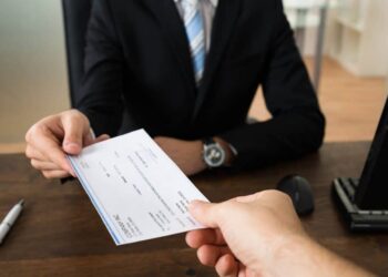 Does the real estate company have the right to deduct money from the security deposit of a tenant?